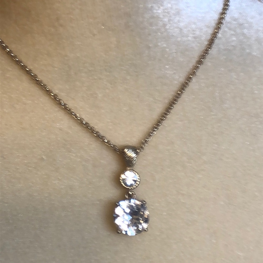 Rhinestone necklace on gold chain and earrings
